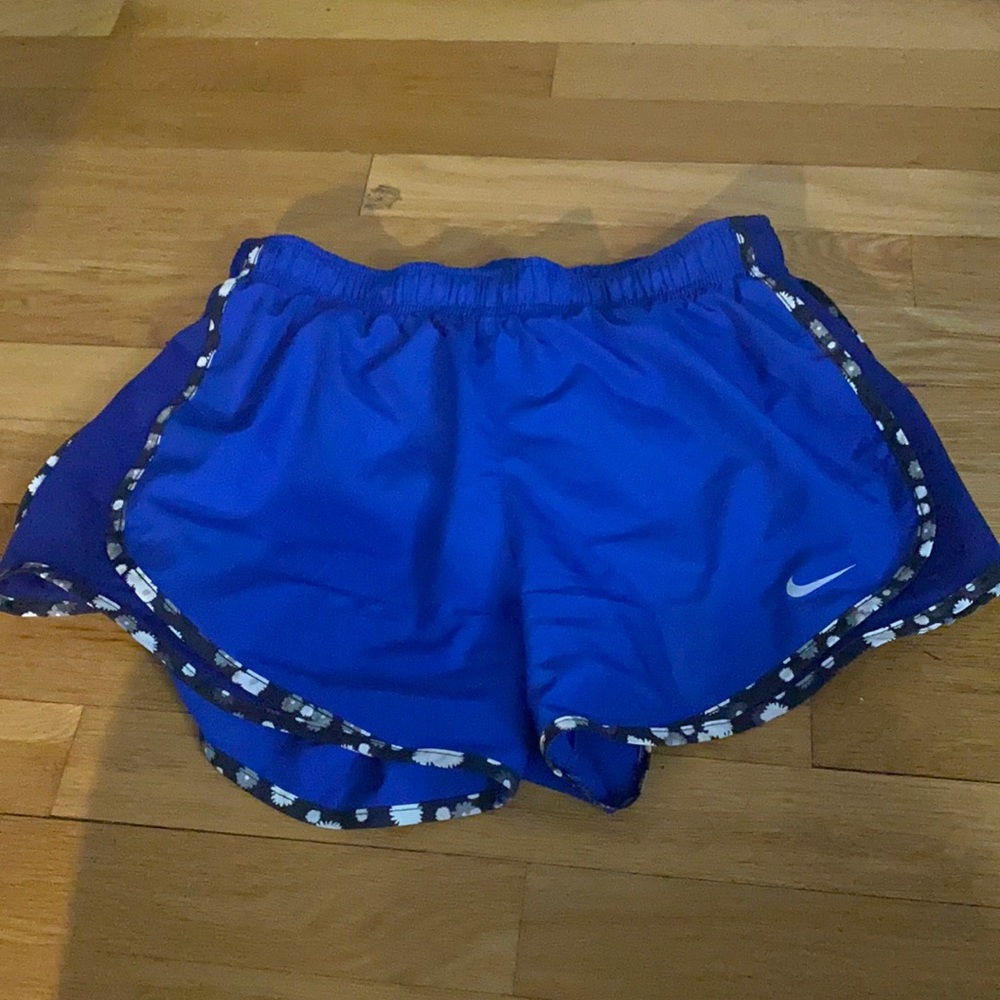 Blue and black Nike athletic shorts